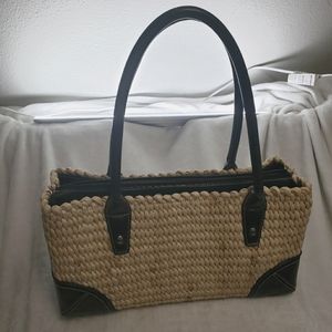 Wicker and black purse summer spring